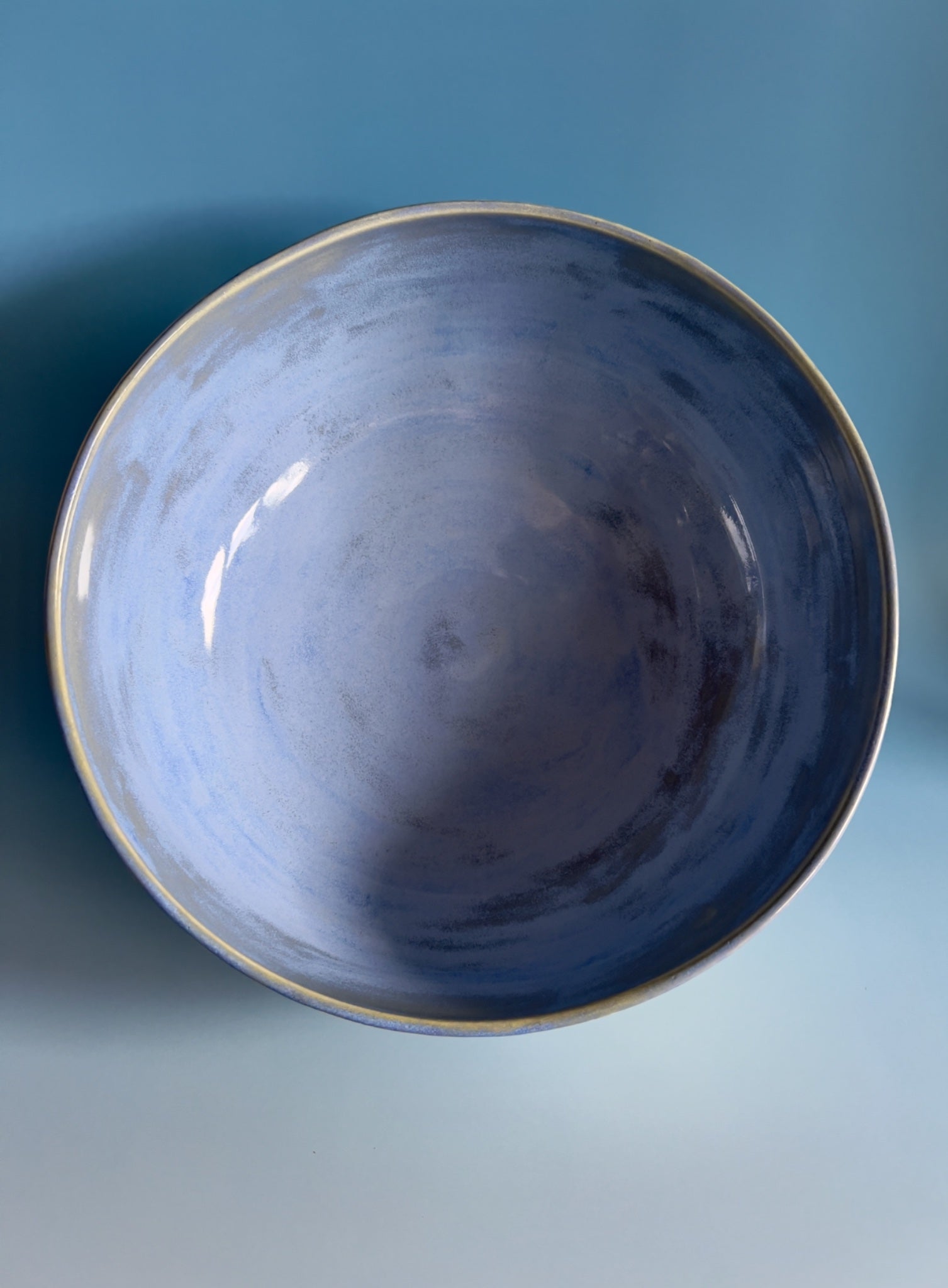 69164a62e1b8ea140711df10_blue-and-raw-tree-bowl-inside-susannah-paterson_1776407282679.jpeg