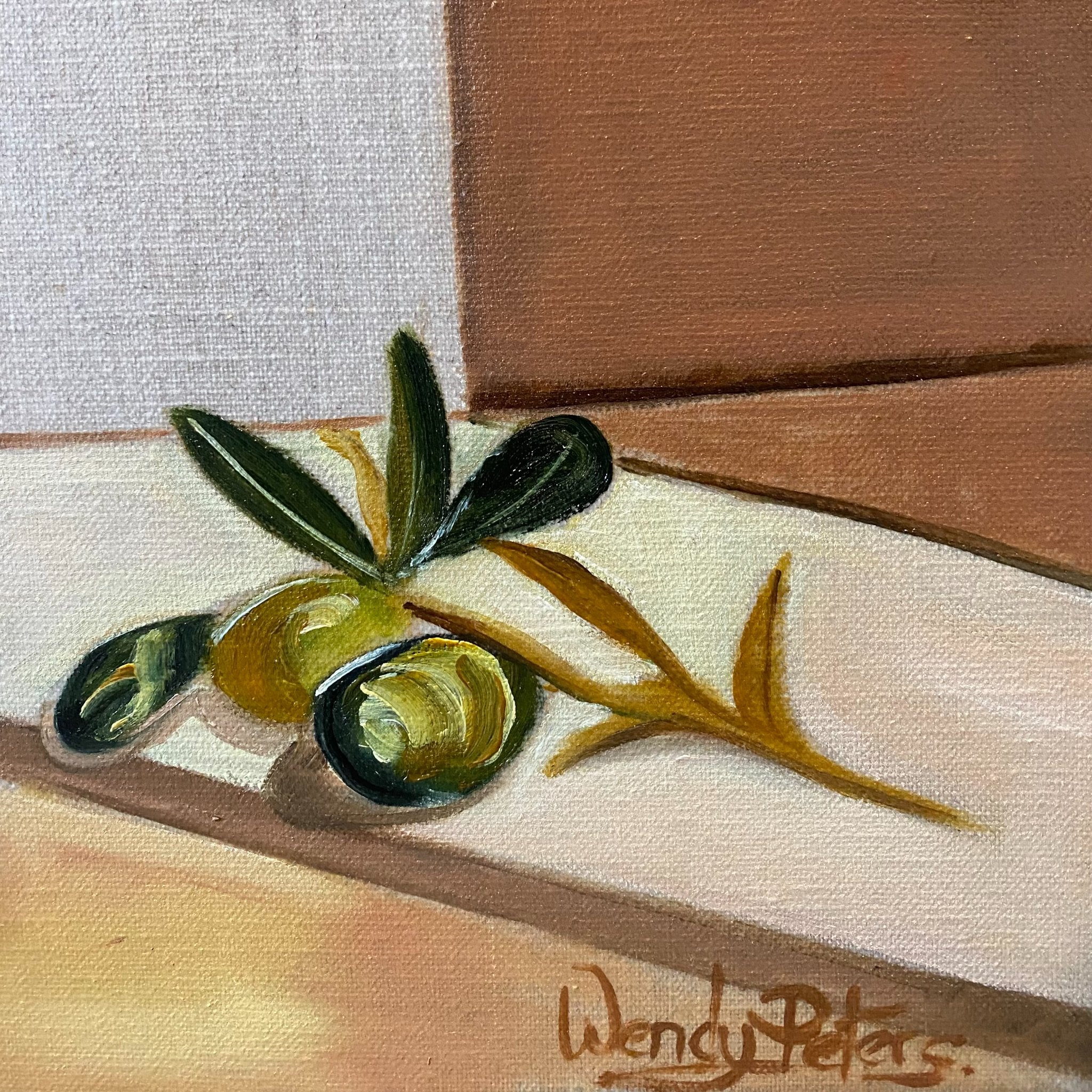69164a62e1b8ea140711df10_blue-glass-and-olive-branch-wendy-peters_1776983642682.jpeg