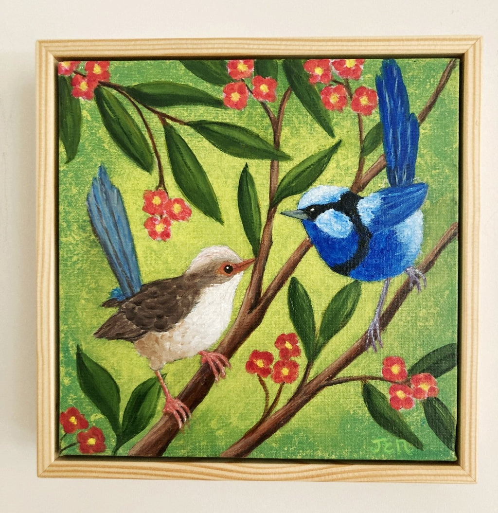 69164a62e1b8ea140711df10_blue-wrens-with-orange-frame-hanging_1779585785370.jpg