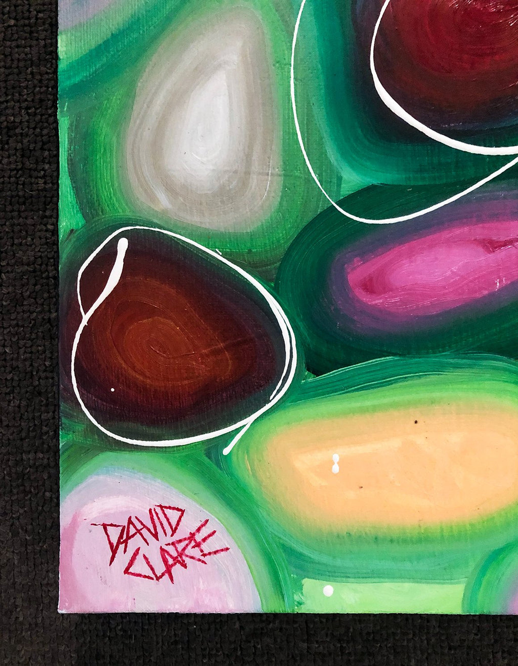 69164a62e1b8ea140711df10_bright-red-and-green-pebbles-sign_1773534354180.jpg