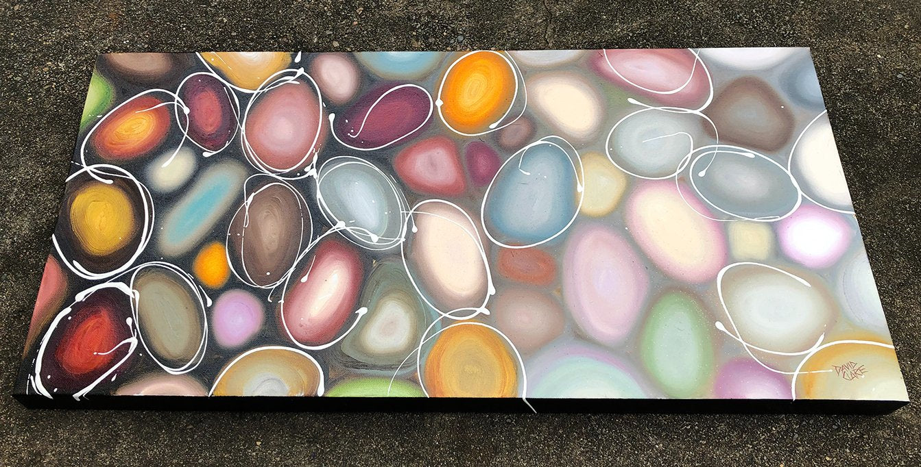 69164a62e1b8ea140711df10_brown-pebbles-bottom_1773535096863.jpg