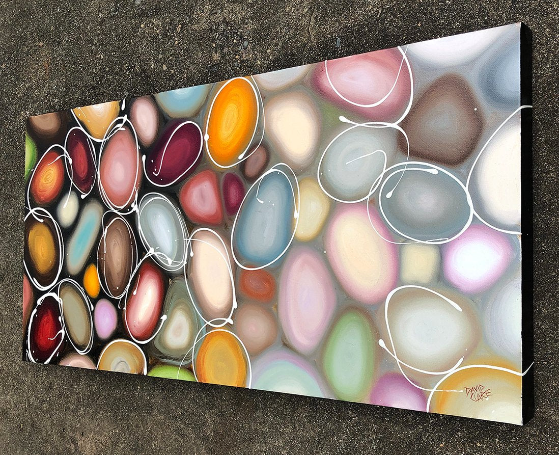 69164a62e1b8ea140711df10_brown-pebbles-hung_1773535096863.jpg
