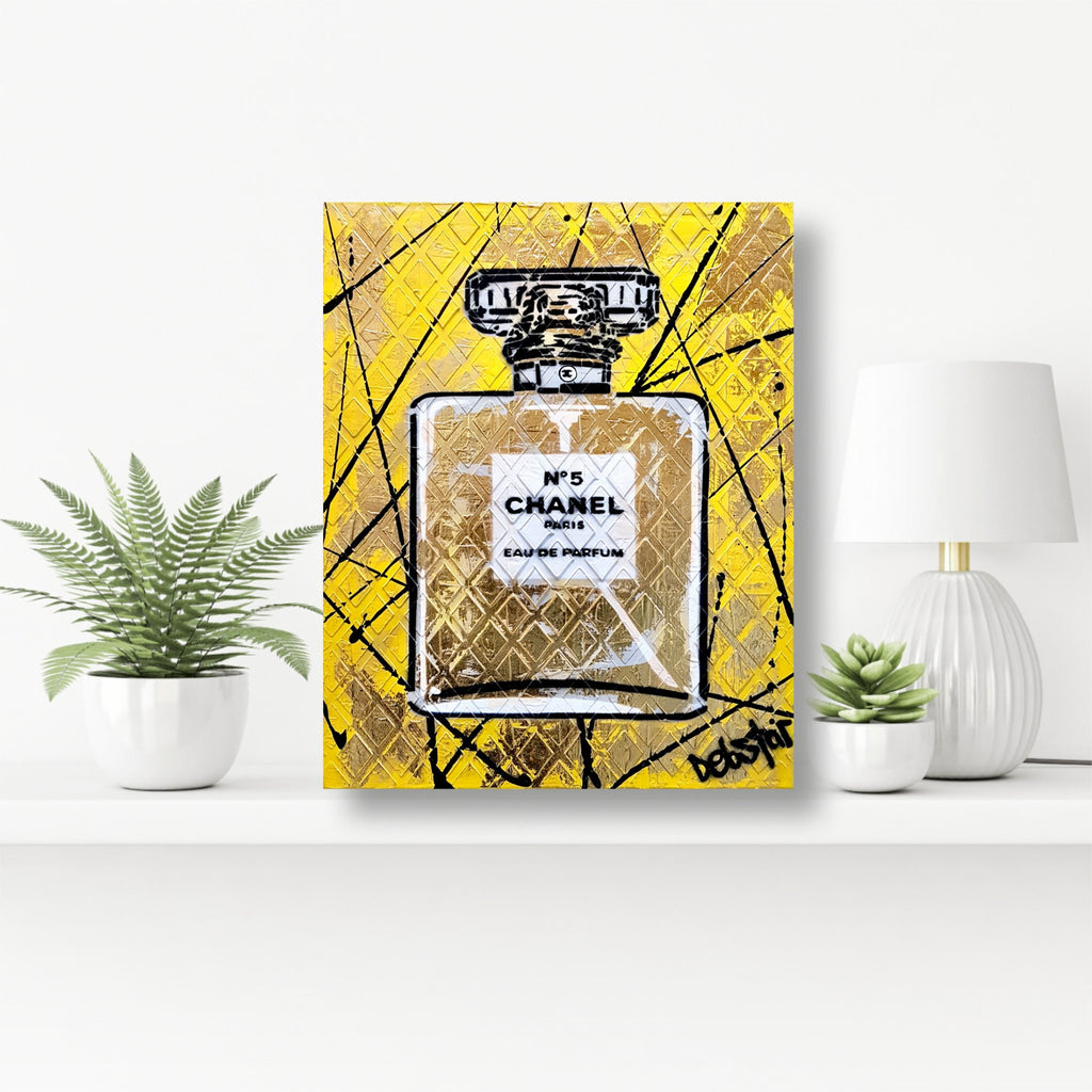 69164a62e1b8ea140711df10_chanel-no5-perfume-yellow-pop-art-deborah-lang-art-urban-canvas-5_1769650083724.jpg