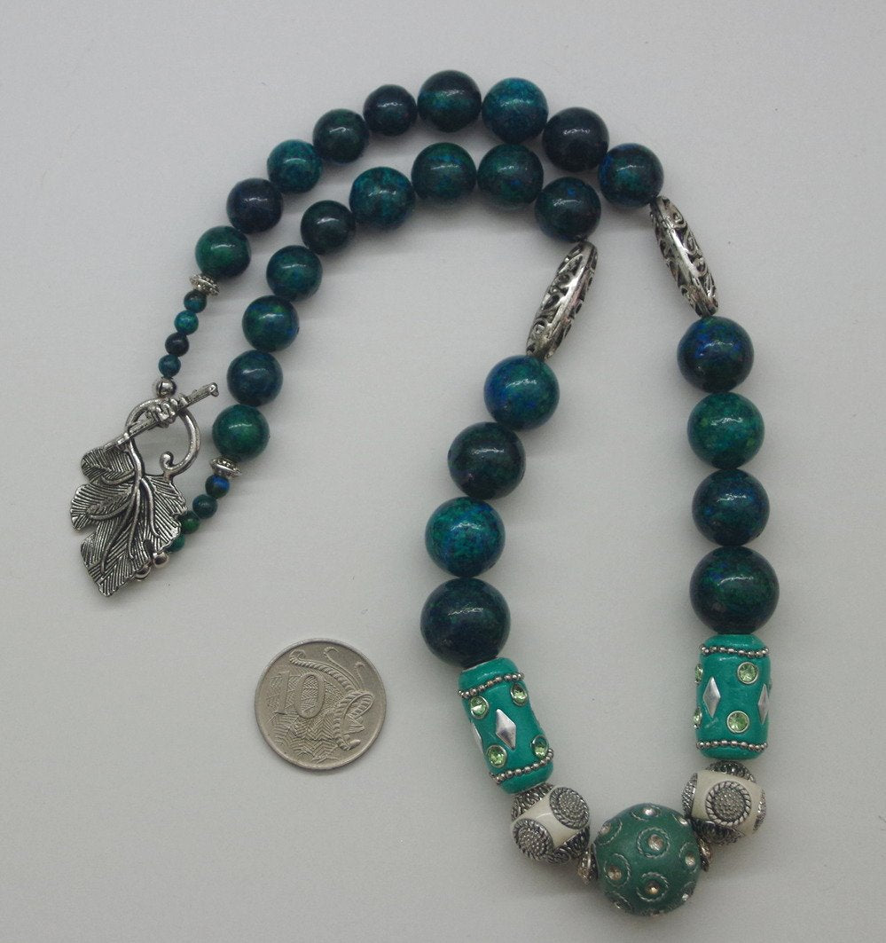 69164a62e1b8ea140711df10_chrysocolla-necklace-1_1768267332822.jpg