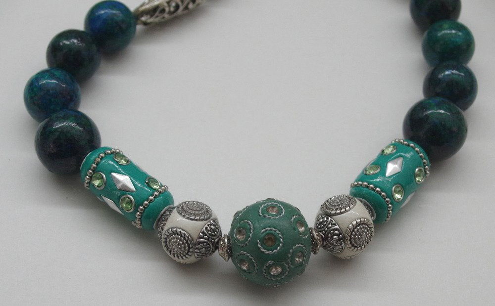 69164a62e1b8ea140711df10_chrysocolla-necklace-2_1768267332823.jpg