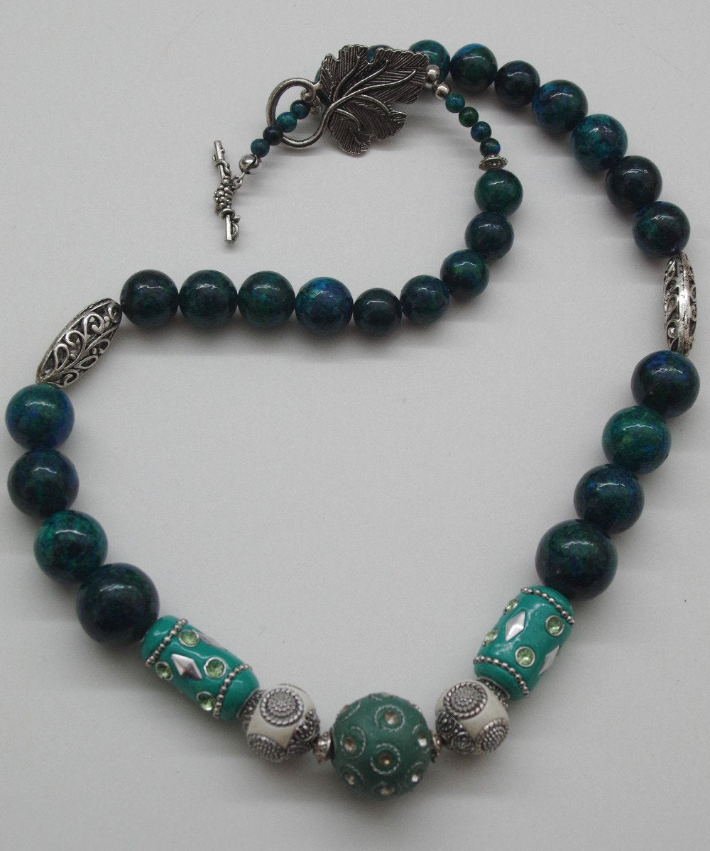 69164a62e1b8ea140711df10_chrysocolla-necklace-4_1768267332824.jpg