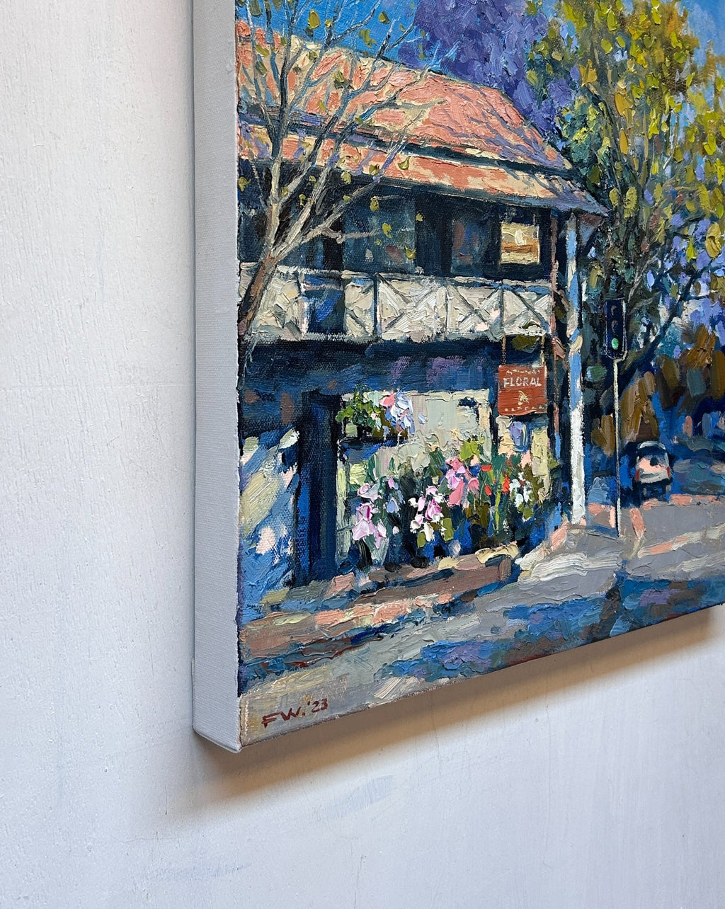 69164a62e1b8ea140711df10_corner-shop-in-spring-45.5x45.5cm-new-side2_1793405634854.jpg
