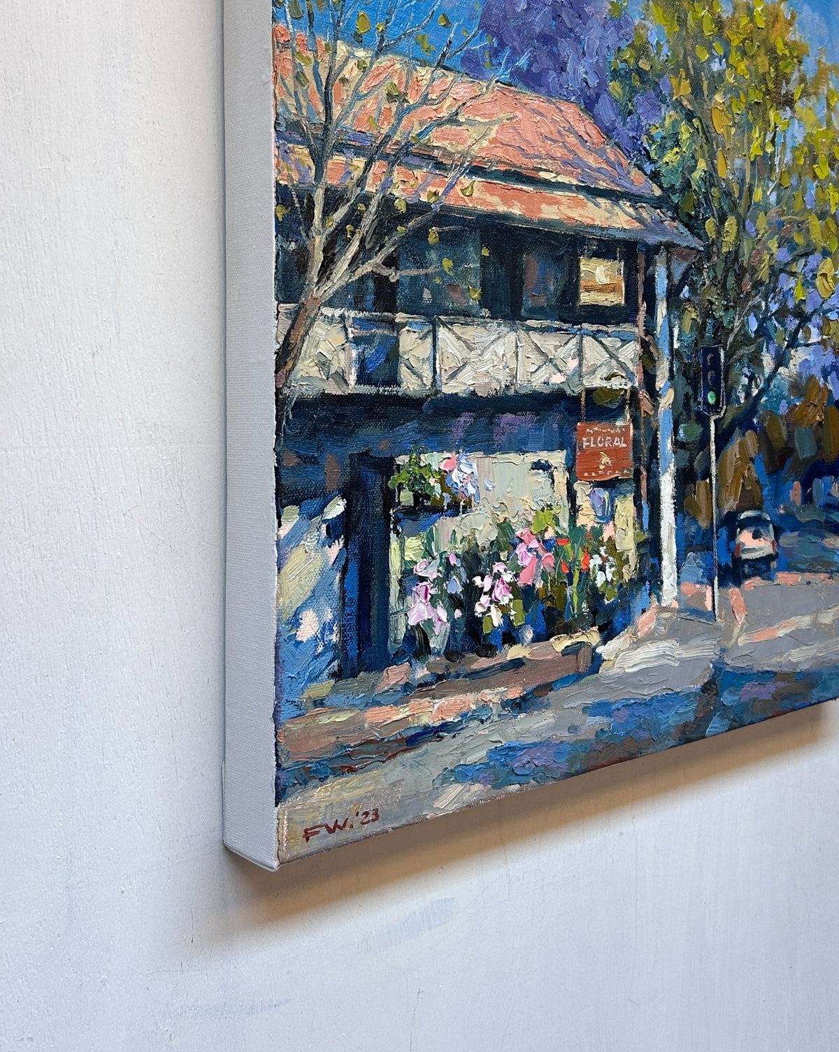 69164a62e1b8ea140711df10_corner-shop-in-spring-45.5x45.5cm-new-side2_1793405634854.jpg