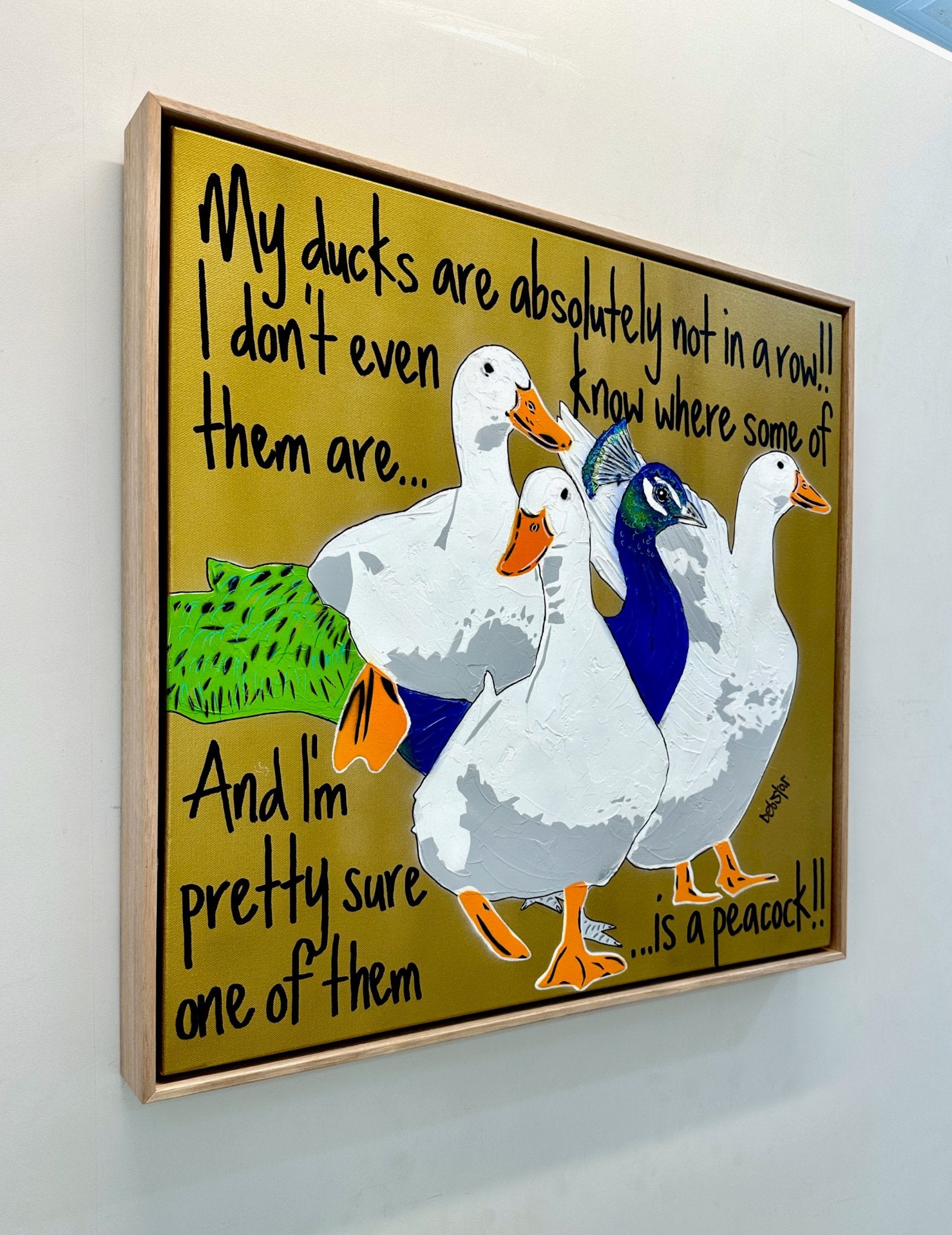 69164a62e1b8ea140711df10_ducks-in-a-row-gold-peacock-pop-art-deborah-lang-debstar-art-urban-canvas-3_1778663121646.jpg