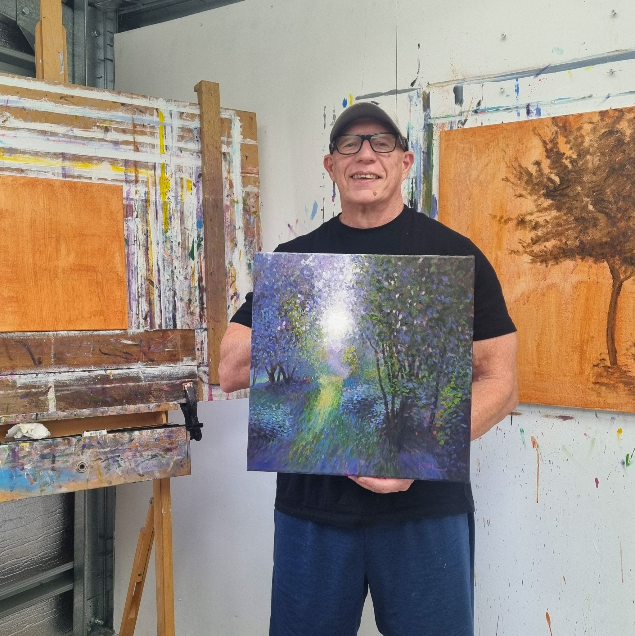 69164a62e1b8ea140711df10_kevin-mckeown-artist-in-the-studio-with-the-secret-garden_1779169804953.jpg