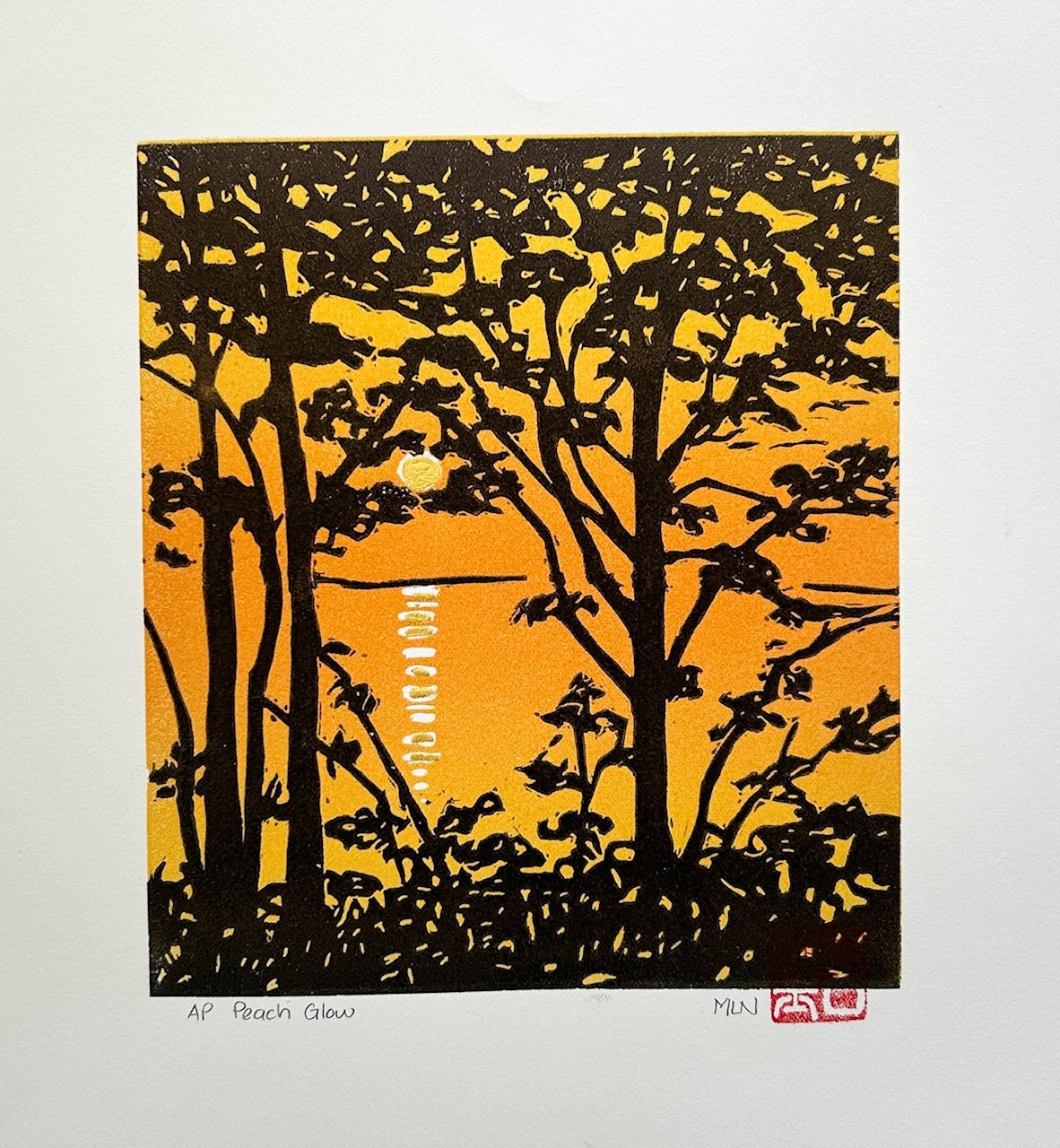 69164a62e1b8ea140711df10_peach-glow-denmark-morning-linocut-gold-leaf-marion-nelson_1774847644878.jpg