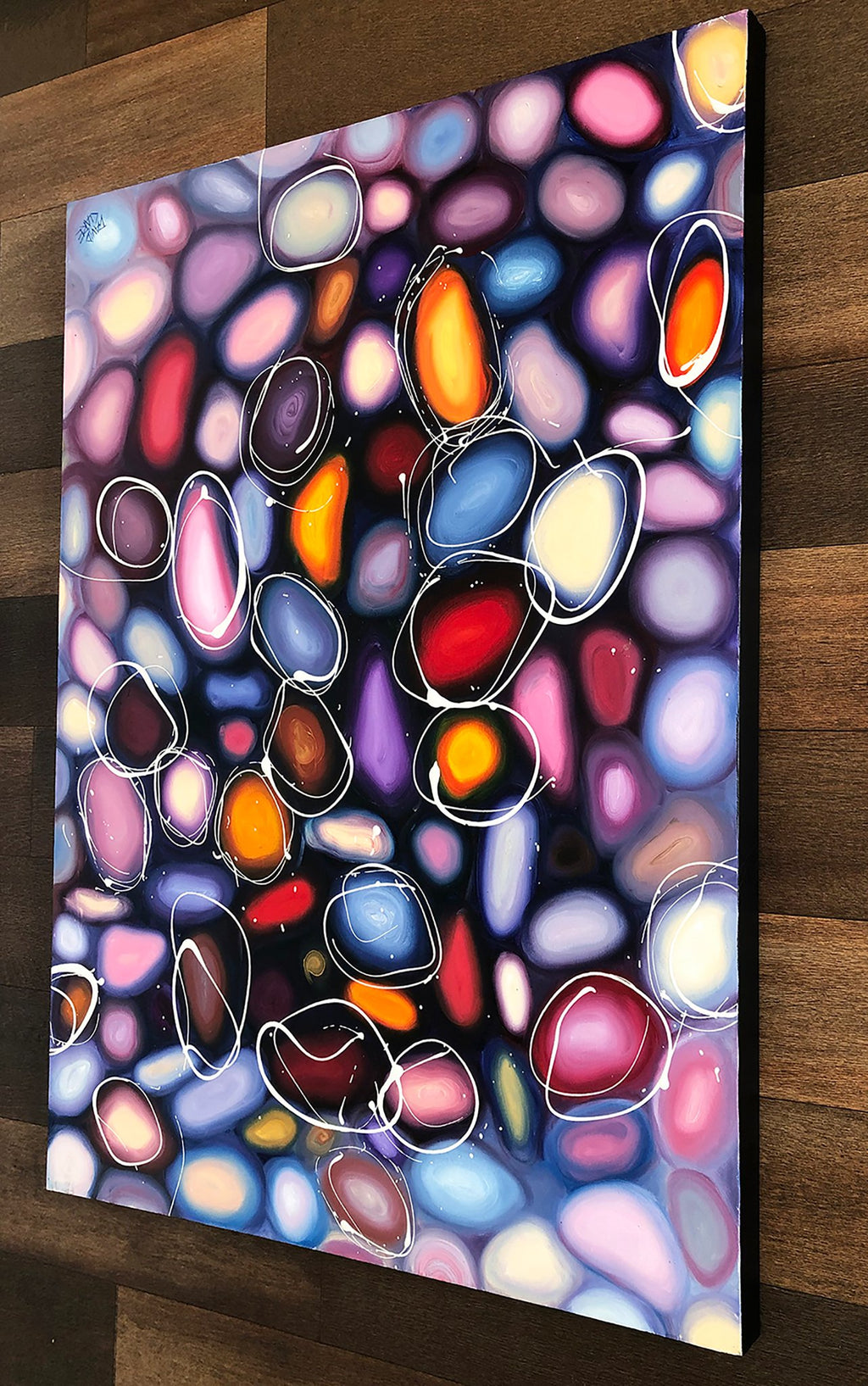 69164a62e1b8ea140711df10_purple-pebbles-hung_1774661940147.jpg