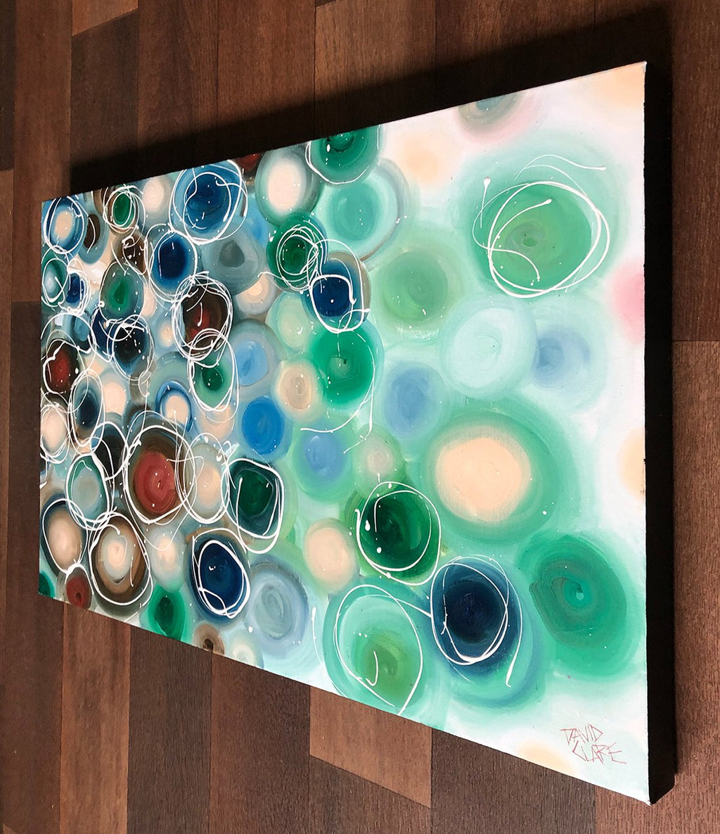 69164a62e1b8ea140711df10_red-and-green-pebbles-hung-left_1774683099854.jpg