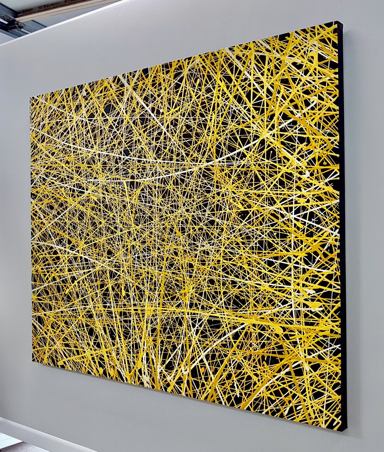 69164a62e1b8ea140711df10_sparkler-yellow-lines-abstract-deborah-lang-art-urban-canvas-2_1767769637835.jpg