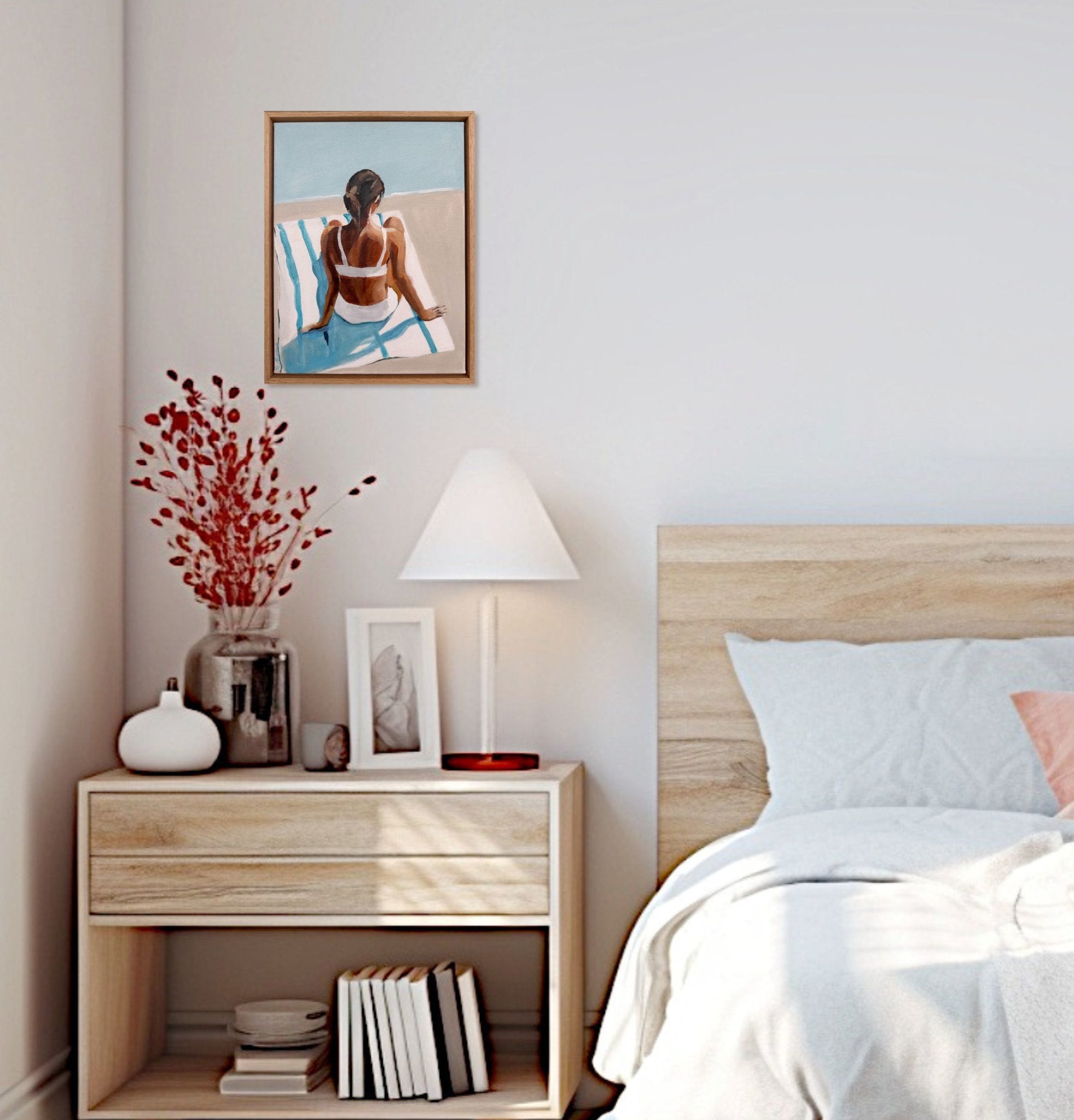 69164a62e1b8ea140711df10_sunbather-in-white-framed-minimalist-art-bedroom-peach-red-white-bikini-stripe-towel-coastal-beach-house-decor_1778470892354.jpg