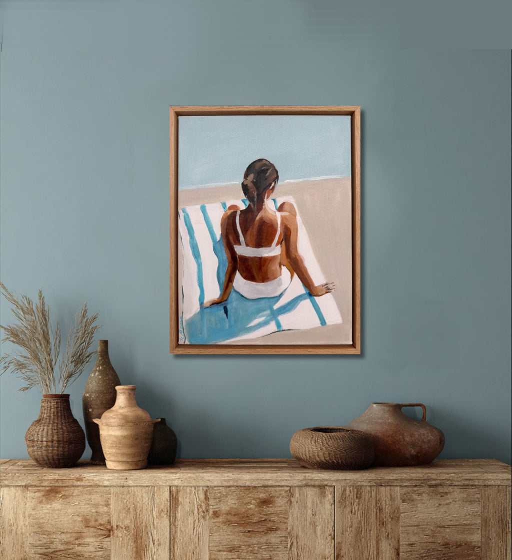 69164a62e1b8ea140711df10_sunbather-in-white-framed-minimalist-art-buffet-spruce-green-white-bikini-stripe-towel-coastal-beach-house-decor_1778470903073.jpg