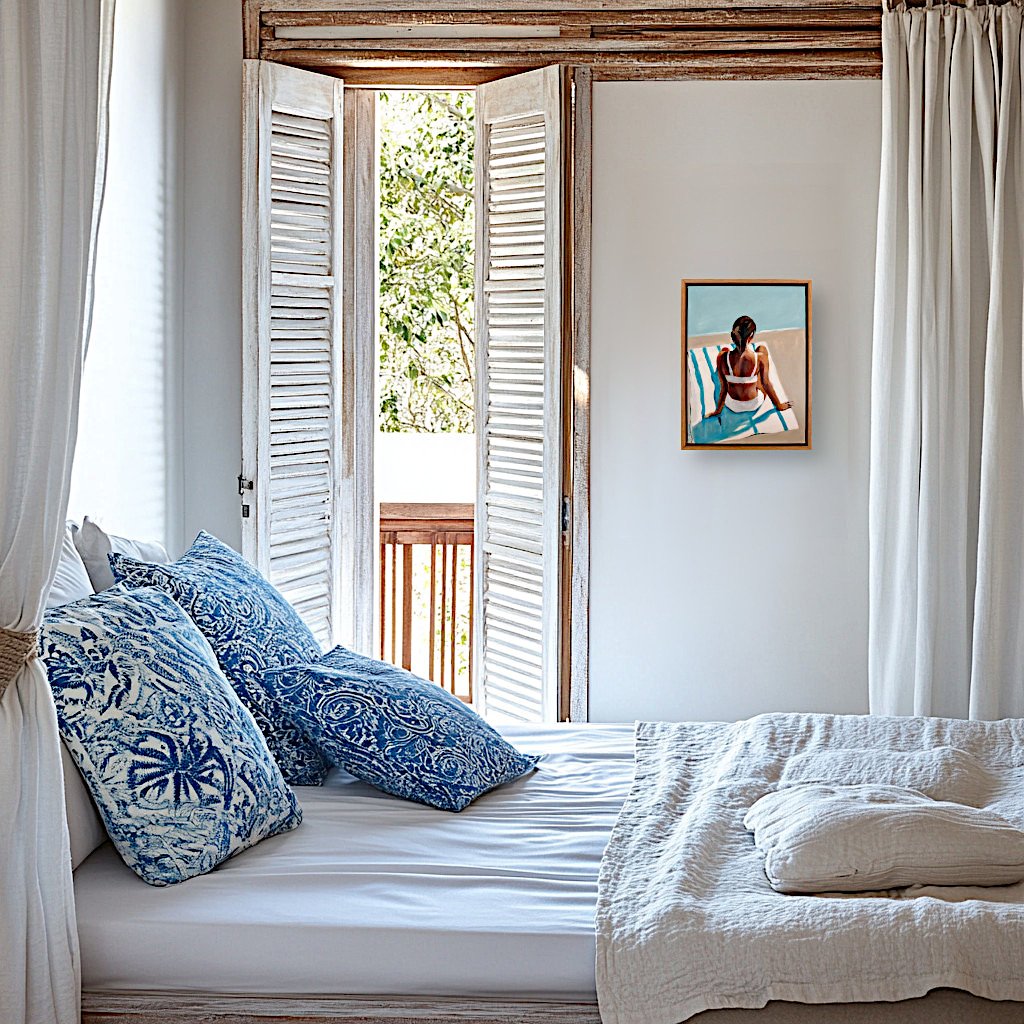 69164a62e1b8ea140711df10_sunbather-in-white-minimalist-art-bedroom-bali-villa-blue-white-cushions-wood-villa-white-bikini-stripe-towel-coastal-beach-house-decor_1778470886816.jpg