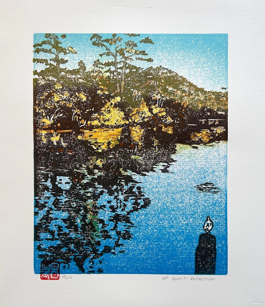 69164a62e1b8ea140711df10_sunlit-reflection-linocut-gold-leaf-by-marion-nelson_1774849901996.jpg