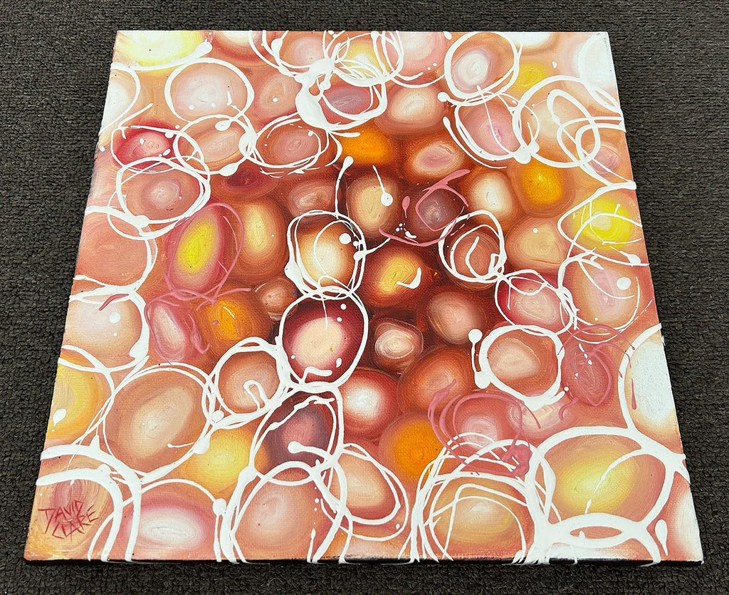 69164a62e1b8ea140711df10_tiny-pink-and-orange-pebbles-bottom-lr_1776715879629.jpg
