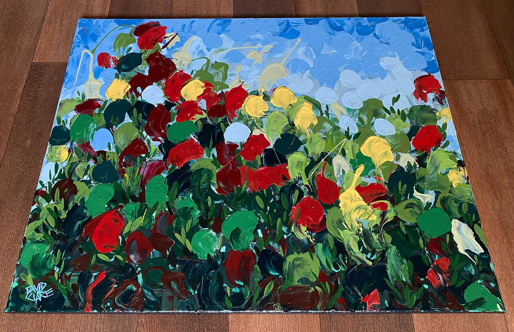 69164a62e1b8ea140711df10_tulips-red-yellow-bottom-lr_1775195797310.jpg