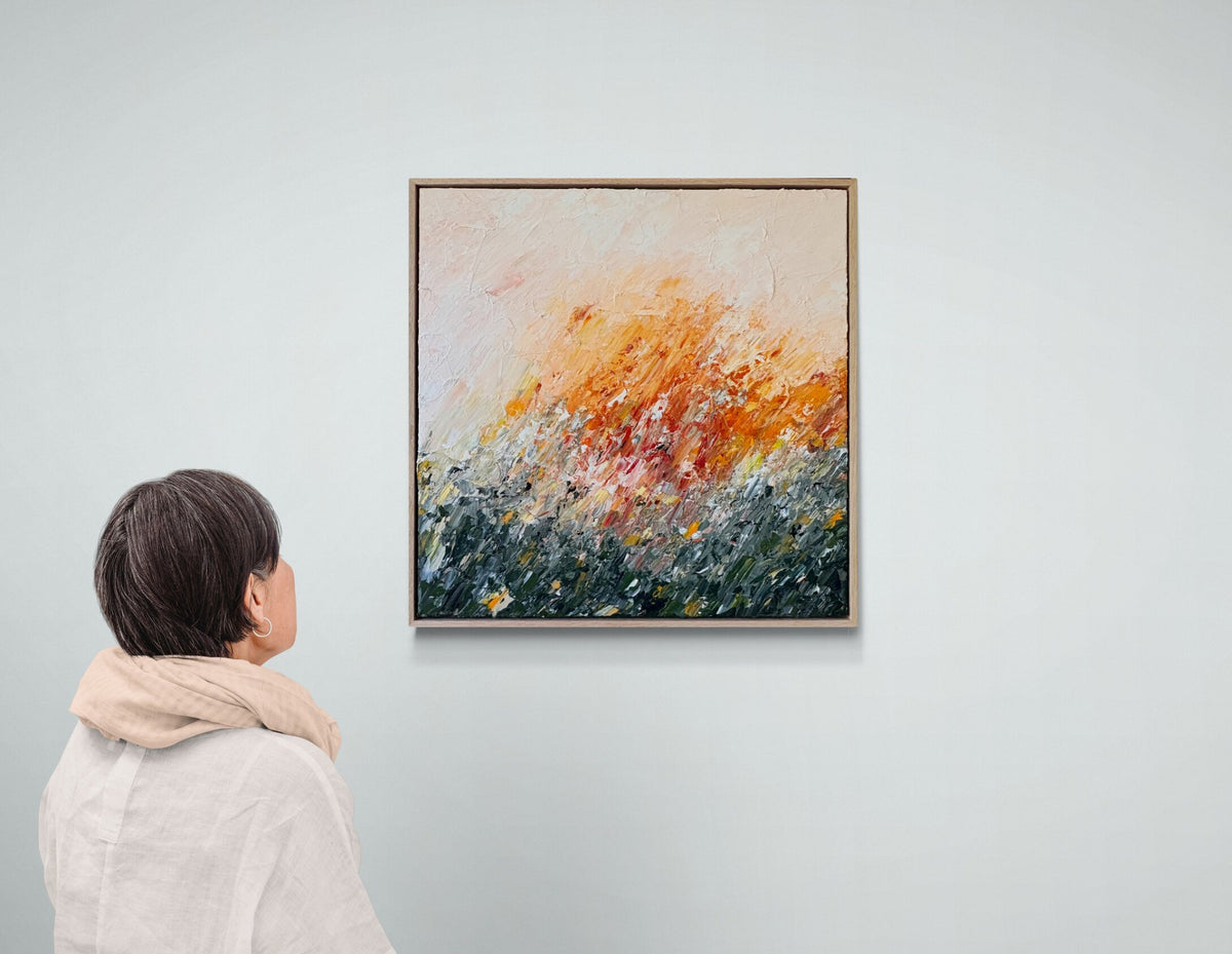 69164a62e1b8ea140711df10_woman-looking-at-a-gallery-wall-4_1790476718242.jpg