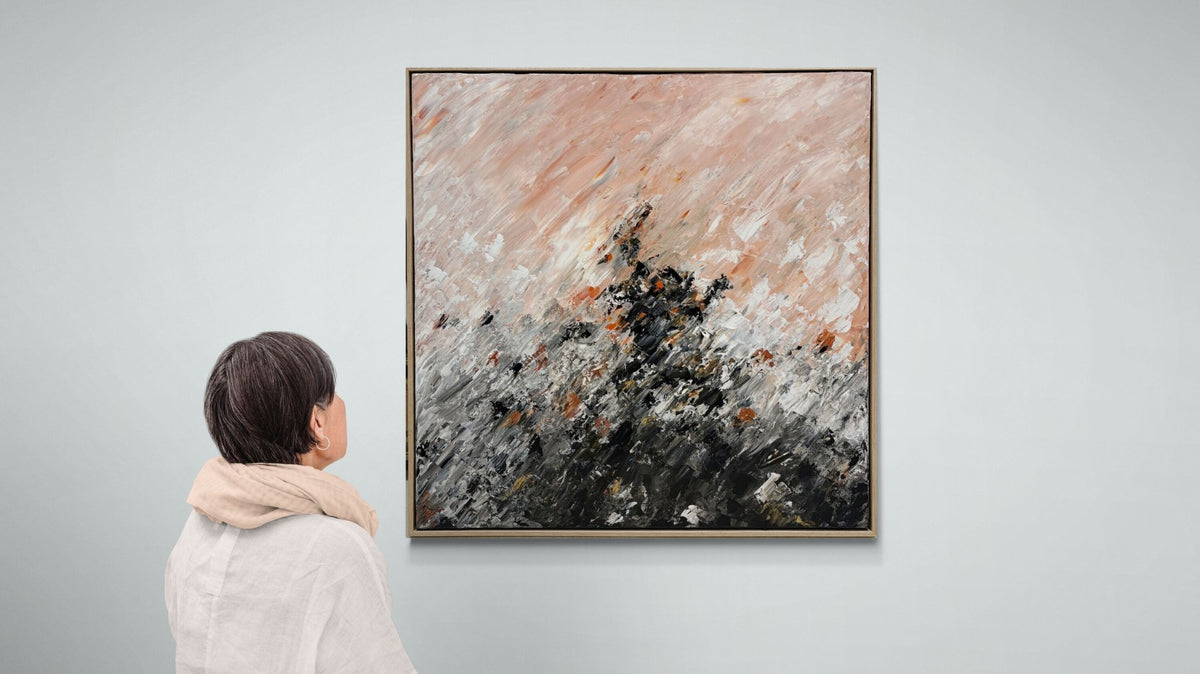 69164a62e1b8ea140711df10_woman-looking-at-a-gallery-wall-5_1791005912811.jpg
