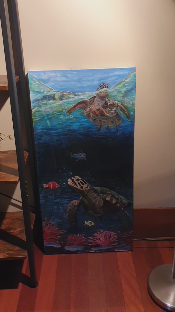 Turtles swimming in deep blue coral bay